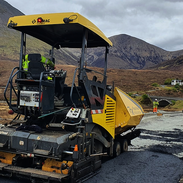 Trevor Harris' Bomag in the highlands, wee bridge and hills in background