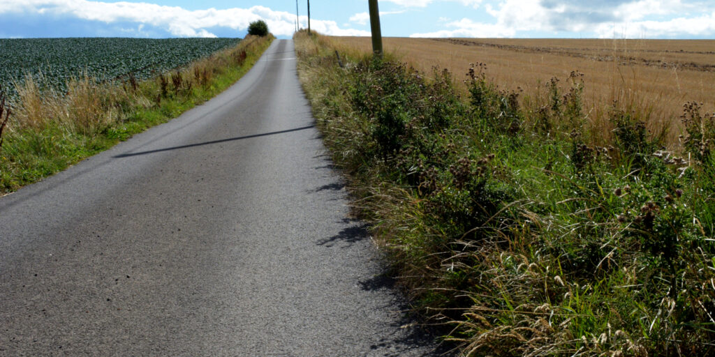 Farm road surfaced by Trevor Harris